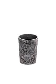 Metal candle burning down the house